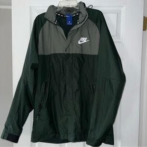 Medium, Green Nike windbreaker jacket.